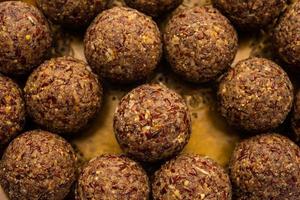 Alsi pinni laddu or flax seed laddo or healthy jawas ladoo are delicious Indian sweet energy balls photo