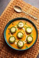 Shaam Savera is a spinach kofta curry where stuffing is made from paneer and the kofta made from spinach photo