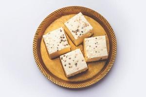 Kharvas or Cheek, Chik, Bari, Pis or Junnu is a sweet dairy product made from bovine colostrum photo