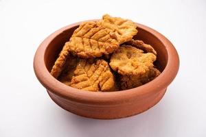 Thekua is an Indian sweet dish.popular in uttarpradesh, bihar and jharkhand.offering for the chhat festival. photo