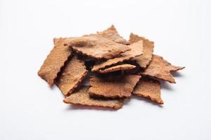 Ragi Chips or Nachni or finger millet wafers, Indian healthy snack photo