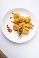 chocolate biscuit pakora, pakodas or fritters, creative Indian teatime snack photo