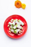 Pista Roll Or Pistachio Rolls Mithai or sigar, Indian sweet or dessert for festivals photo