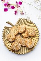 Amrit peda or Amrut pedha or pera is an Indian sweet made from milk and sugar with coconut topping photo