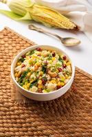 Sweet Corn Upma, makai rava uppittu made using with or without semolina , healthy Indian breakfast photo