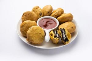 chocolate biscuit pakora, pakodas or fritters, creative Indian teatime snack photo