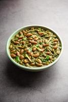 Palak rajma Masala is an Indian curry prepared with red kidney beans and spinach cooked with spices photo