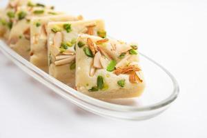 Milk powder barfi also known as Mava burfi, white Khoya burfi or Barfee, Indian Sweet food photo