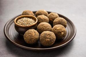 Bajra Atta Ladoo or kuler laddoo - Millet Flour Laddu, a popular winter sweet snack food from India photo