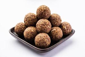 Alsi pinni laddu or flax seed laddo or healthy jawas ladoo are delicious Indian sweet energy balls photo