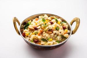 Sweet Corn Upma, makai rava uppittu made using with or without semolina , healthy Indian breakfast photo