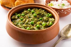 Hariyali green Pav bhaji is a variation of a traditional pav bhaji made using leafy vegetables photo