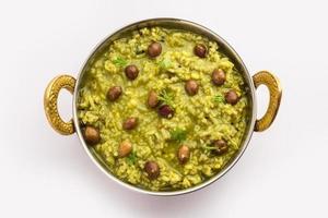 Palak khichdi is a one pot nutritious meal of mung lentils and rice with spinach, Indian food photo
