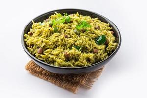 Palak khichdi is a one pot nutritious meal of mung lentils and rice with spinach, Indian food photo