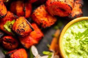 Tandoori Soya Chaap or soy chap dish prepared by marinating in tandoori spices, closeup view photo