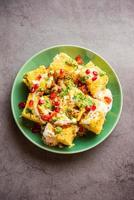 Khaman Dhokla chaat is a very simple and refreshing fusion chaat recipe made using leftover dhokla photo