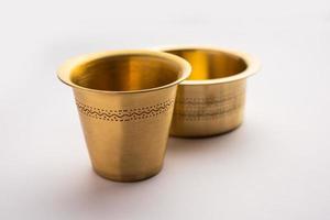 South Indian filter Coffee or tea Brass or stainless steel empty Tumbler Cup and saucer or glass photo
