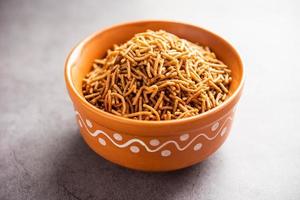 Nachni or Ragi Sev is a delicious crispy noodle made from finger millets, healthy Indian food photo