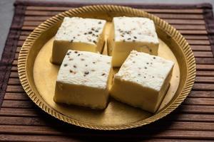 Kharvas or Cheek, Chik, Bari, Pis or Junnu is a sweet dairy product made from bovine colostrum photo