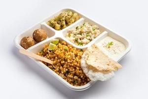 Indian Upwas thali, fasting food platter or thali for home delivery or takeaway parcel for any Vrat photo