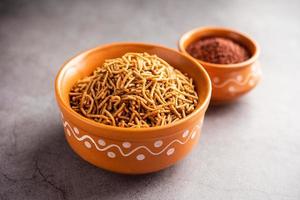 Nachni or Ragi Sev is a delicious crispy noodle made from finger millets, healthy Indian food photo