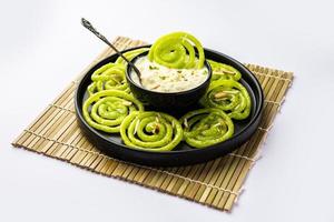 Rabdi Jalebi - Green jilebi or imarati with Rabri made from condensing milk, Indian dessert photo