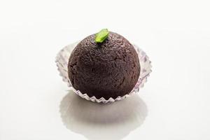 Indian Sweet Food Sweet Black Gulab Jamun Also Known as Kala Jamun, Black Jamun or Dry Kala Jam photo