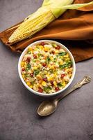 Sweet Corn Upma, makai rava uppittu made using with or without semolina , healthy Indian breakfast photo