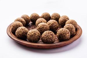 Alsi pinni laddu or flax seed laddo or healthy jawas ladoo are delicious Indian sweet energy balls photo