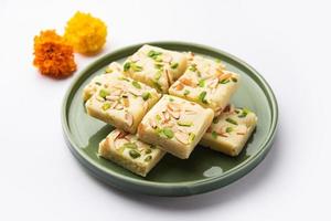 Milk powder barfi also known as Mava burfi, white Khoya burfi or Barfee, Indian Sweet food photo