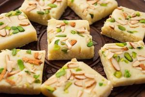 Milk powder barfi also known as Mava burfi, white Khoya burfi or Barfee, Indian Sweet food photo