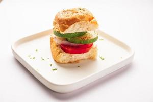 Mumbai style pav sandwich or leftover paav used for veg burger photo