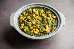 Palak sweet corn sabzi also known as Spinach Makai curry sabji, north Indian main course menu photo