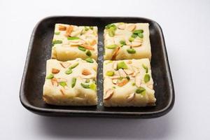 Milk powder barfi also known as Mava burfi, white Khoya burfi or Barfee, Indian Sweet food photo