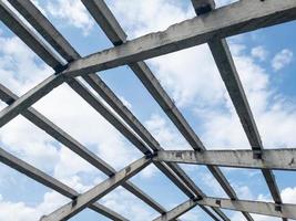 Concrete frame gable roof background. photo