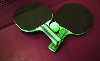 table tennis ping pong two paddles photo