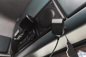 CB radio with microphone inside the truck photo