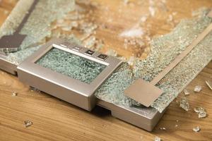 Overweight concept. Cracked glass weighing scale photo