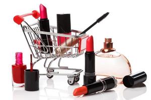 Shopping trolley with make-up products photo