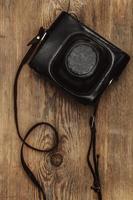 Retro camera in leather case photo