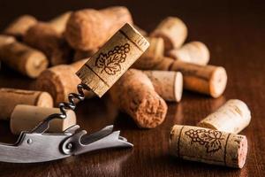 Corkscrew and corks photo