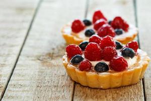 Sweet cakes with berries photo