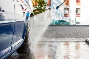 Blue car in a car wash photo