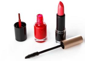 Mascara, nail polish and lipstick photo