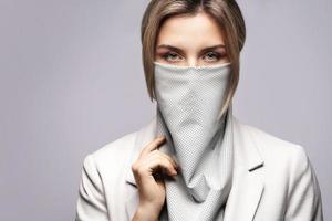 Beautiful woman wearing stylish leather neck gaiter instead of prevention mask photo