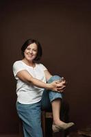 Portrait of a beautiful middle aged woman posing in a studio photo