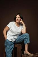 Portrait of a beautiful middle aged woman posing in a studio photo