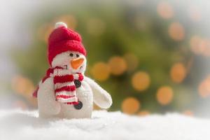 Cute Snowman Over Abstract Background photo