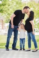 Happy couple with little boy photo