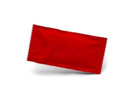 Blank Red Condiment Packet Floating Isolated on White Background photo